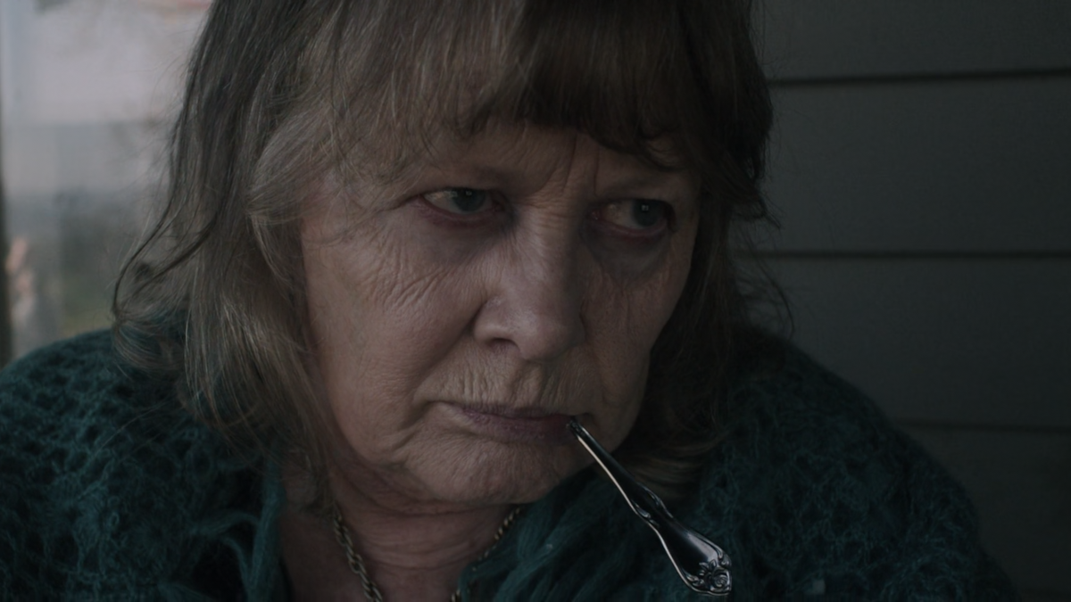 Gramma is a senile old lady. She has a spoon in her mouth. She refuses to let it go.