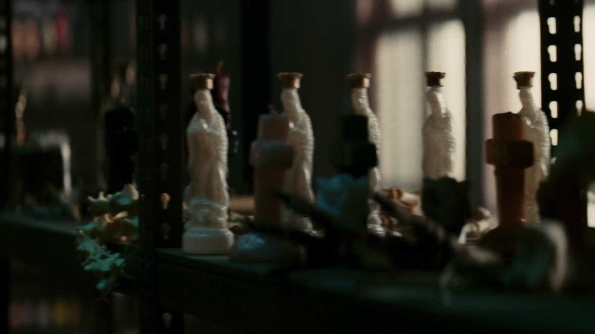 A rack filled with various Hoodoo trinkets.